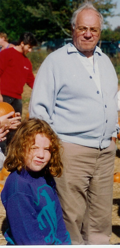 Tricia and her Grandfather picking pumpkins